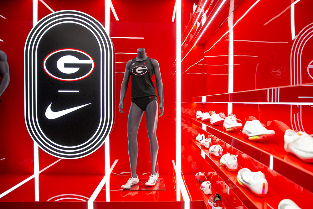 University of Georgia Track and Field branding and uniform in black and red against reflective background